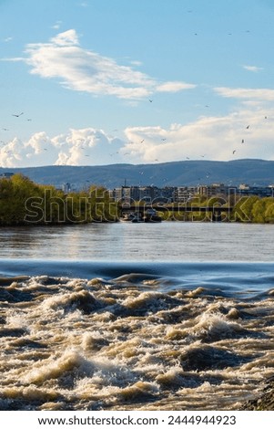 Sunset over Sava river in Zagreb city, Croatia after few rainy days Royalty-Free Stock Photo #2444944923