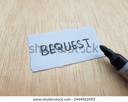Bequest writting on table background. Royalty-Free Stock Photo #2444962493