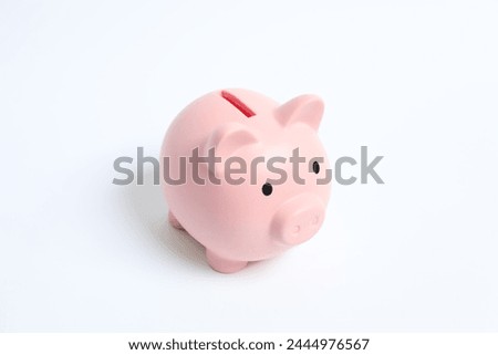Piggy coin bankisolated on white background for money savings, financial security or personal funds concept