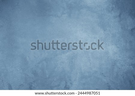 Grunge Grey Blue Venetian Plaster Wall Background. Abstract rough Stucco Texture. Beautiful backdrop for design.