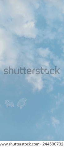 Charming morning blue sky and white clouds Royalty-Free Stock Photo #2445007023