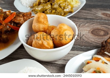 A view of a bowl of fry dumplings.