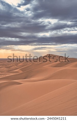 Sand dunes of a cloud-filled Gobi desert