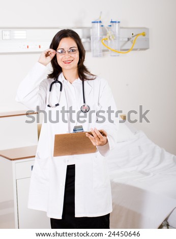 doctor in medical ward with report