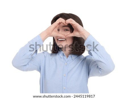 Happy woman looking through folded in shape of heart hands on white background