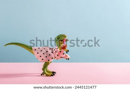 Cute dinosaur drinks coconut water and hawaiian shirt on pink and blue background.