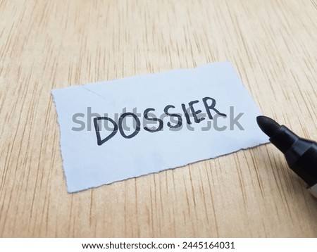 Dossier writting on table background.