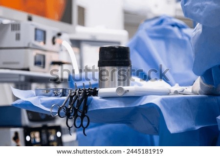 Instrument for laparoscopic surgery. Tools for surgery on the table in the operating room. Concept of modern medical equipment and technologies.