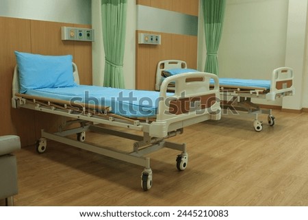 Hospital room with beds and comfortable medical equipped. Recovery Room with beds and comfortable medical. Interior of an empty hospital room.