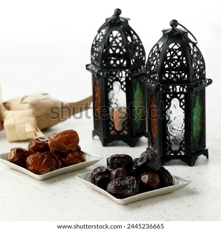Ajwa and Sukkari Dates for Iftar Ramadan with Moroccan Lamp. Square Picture 