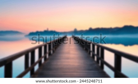 Sunset on the bridge blurred abstract background. Defocus sunrise wallpaper with beautiful sky on the river