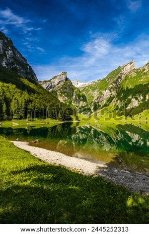 Beautiful Mountain Lake Seealpsee in the European Alps of Switzerland - 4K Royalty-Free Stock Photo #2445252313