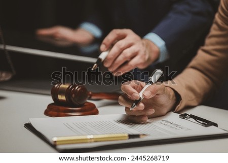A group of lawyers and clients are discussing the contract they will be signing together in the future, Collaborative brainstorming between lawyers and clients