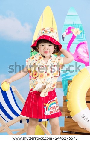 Portrait asia girl in a colorful dress in Seaside, beach mood with beach chairs, rubber rings, surf boards in a bright, cheerful, cute look.