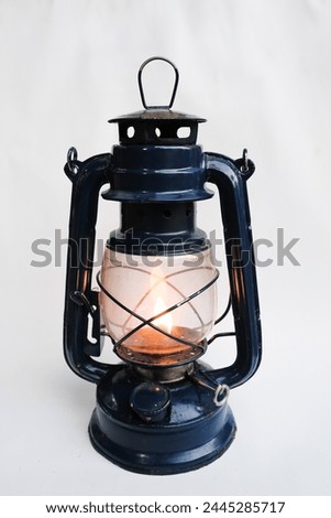 lanterns are on for camping on a white background