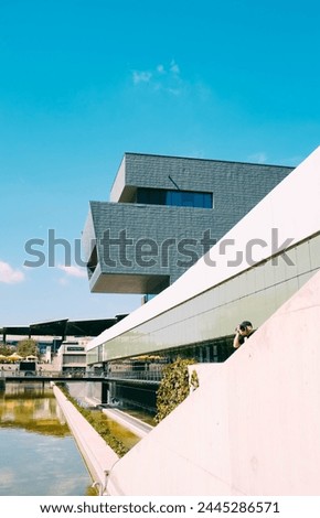 A image of modern building and photographer
