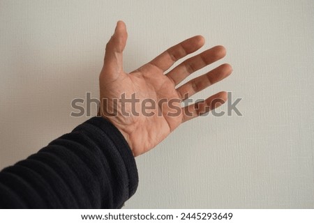 a hand of a 50 year old white man