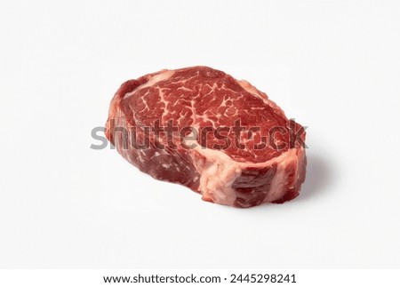A succulent ribeye steak, perfectly grilled and isolated against a clean background. Royalty-Free Stock Photo #2445298241