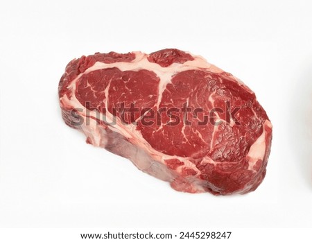 A succulent ribeye steak, perfectly grilled and isolated against a clean background. Royalty-Free Stock Photo #2445298247
