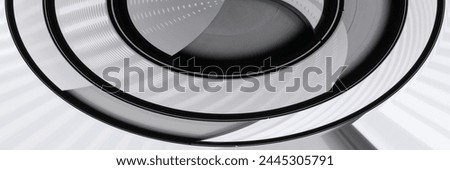 Lighting fixture built in ceiling. Round architectural detail. Framgent of minimal interior design. Close-up of modern architecture. Geometric pattern with circular structure. Technological background Royalty-Free Stock Photo #2445305791