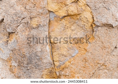 Raw Gray and Brown Rock Stone Texture with Rough hard Clifff Cracks