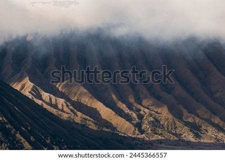 Mount Bromo with smoke, Mount Batok at front, and Mt Gunung Semeru at back, volcano, eruption, Bromo Tengger Semeru Indonesia