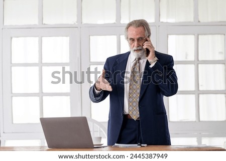 Senior businessman working talking. Senior retirement man enjoys interviews or talking. Portrait of skilled financial advisor lead online course old entrepreneur and virtual communication concept.