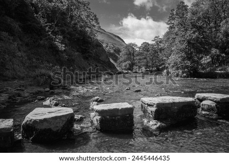 Stepping stones in the river dove in peak district national park. Royalty-Free Stock Photo #2445446435