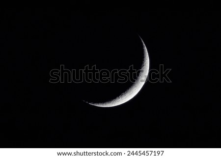  Crescent Moon in the night sky,Detailed,Crescent Moon on black,Ramadan and eid theme.
