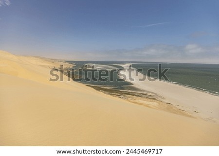 Picture of the dunes of Sandwich Harbor in Namibia on the Atlantic coast during the day in summer