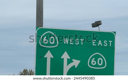 Green highway sign for California state route 60 east and west bound