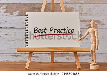 There is notebook with the word Best Practice. It is as an eye-catching image.