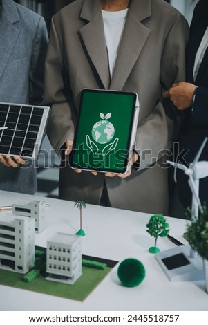 Carbon offset price report CO2 emission. Future growth Net zero waste in ESG ethical SME office protect climate change global warming social issues project. Group of asia people Eco friendly SDGs plan Royalty-Free Stock Photo #2445518757