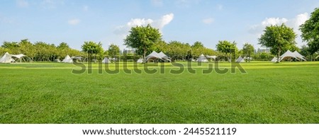 Park Camping Grassland under Blue Sky and White Clouds