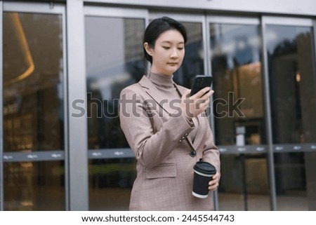 Corporate Professional Engaging with Tech on the Go