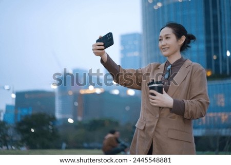 Professional Woman Enjoying Coffee Break with Selfie