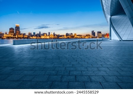 City Square floor and Shanghai skyline with modern buildings at night. Famous Bund buildings scenery in Shanghai. 