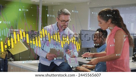 Image of graphs and changing numbers over diverse coworkers discussing reports in office. Digital composite, multiple exposure, report, business, growth, planning, teamwork and technology concept.