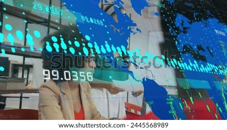 Image of graphs, changing numbers and map over diverse woman sharing ideas with coworkers. Digital composite, multiple exposure, report, business, global, discussion and teamwork concept.