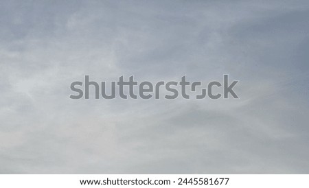 Blue gray light sky nature white clouds whether background, sun face . High quality photo