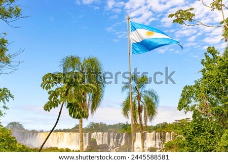 Amazing view of Iguazu fall and Argentinian flag from Argentina side