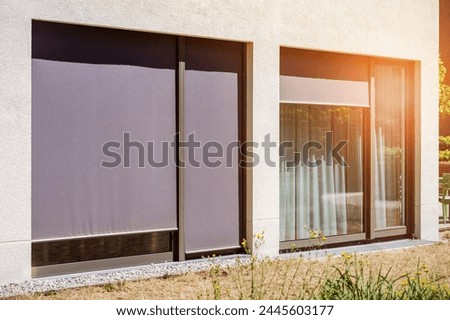 Window Roller Blinds Outside of Modern Facade House. External Shutters. Sun Protection Exterior House.	 Royalty-Free Stock Photo #2445603177
