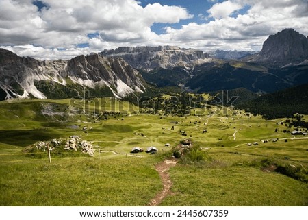 Natural landscape of Seceda, Val Gardena, Dolomites, Italy. Royalty-Free Stock Photo #2445607359