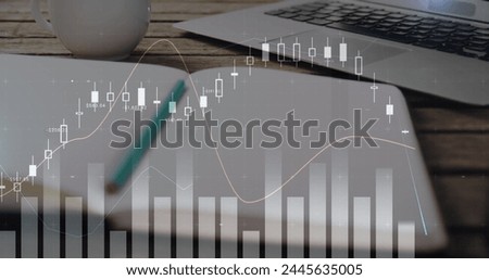 Digital image of graphs moving in the screen with a background of a gadgets in a table and a vintage film camera 4k