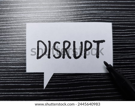 Disrupt writting on table background.