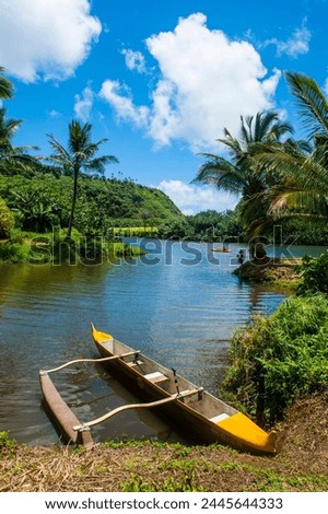 Dugout canoe on the Wailua River. Kauai, Hawaii, United States of America, Pacific Royalty-Free Stock Photo #2445644333