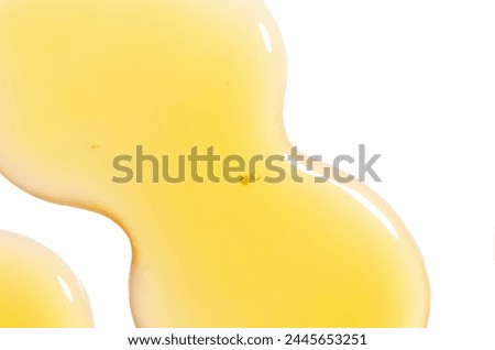 drops of gel serum cosmetic products close-up on white background