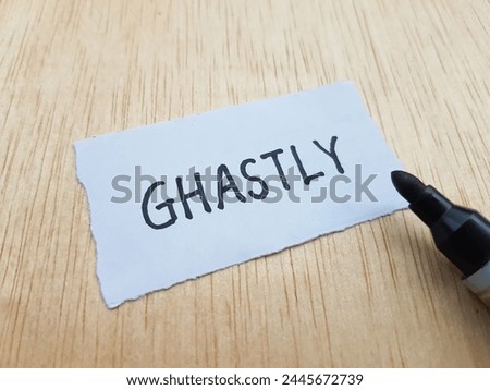 Ghastly writting on  table background.