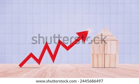 a red up arrow and wooden house. The concept of the rising price of real estate, high demand for real estate, growth of rental rates and mortgage sales of apartments. Population grows.