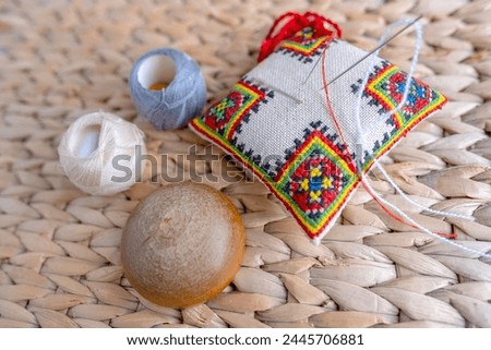 Wooden darning mushroom, clothing repair materials, home needlework, Exploring Textile Restoration, Sustainable DIY Fiber Projects Royalty-Free Stock Photo #2445706881